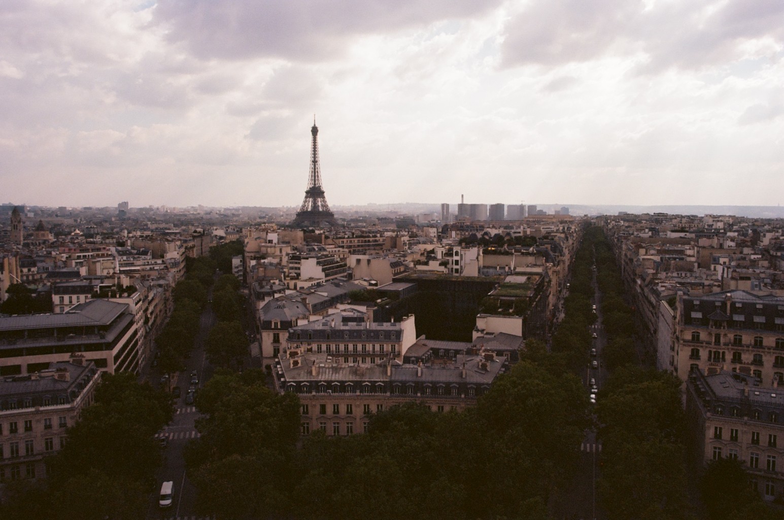 Looking over Paris, atop the Arc de Triomphe. 
