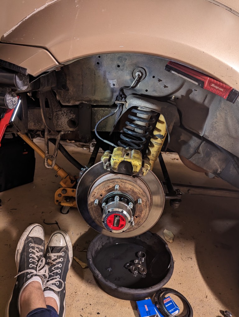 Replacing the bearings and seals in the swivel hubs.