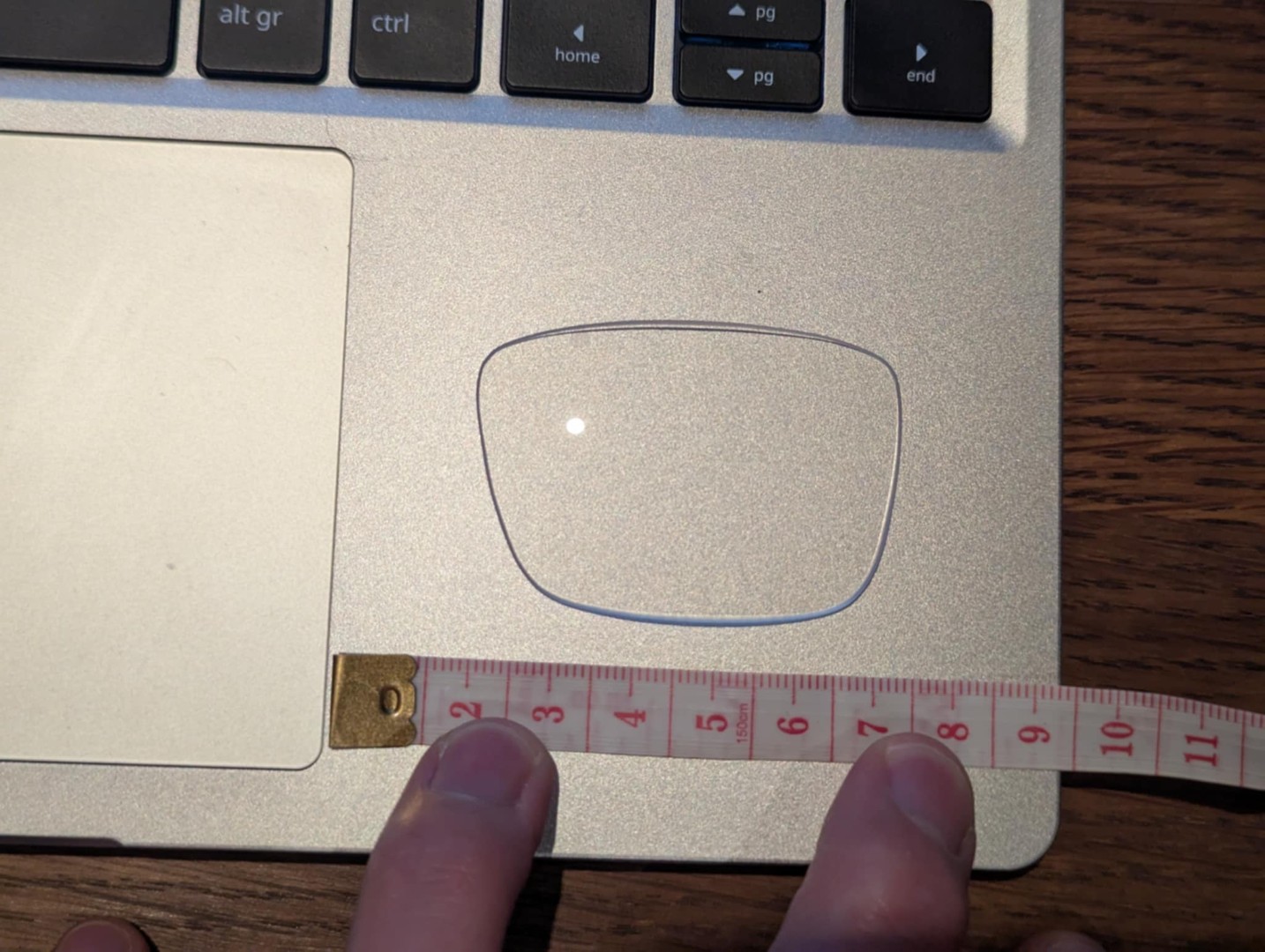 Design process: image of lens with ruler for scaling in software. 